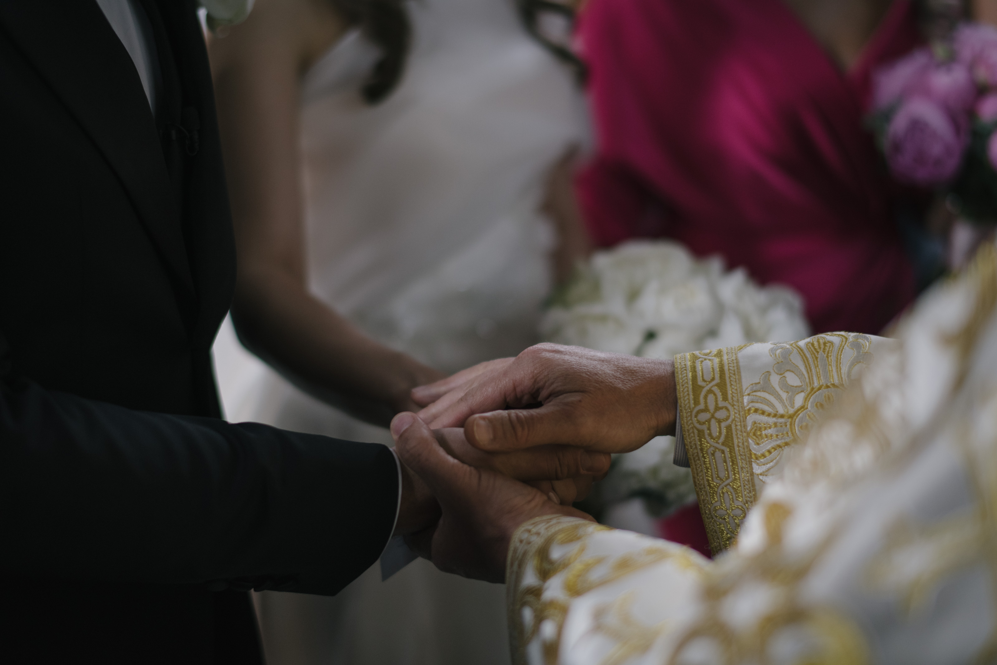 Orthodox wedding ceremony holding hands